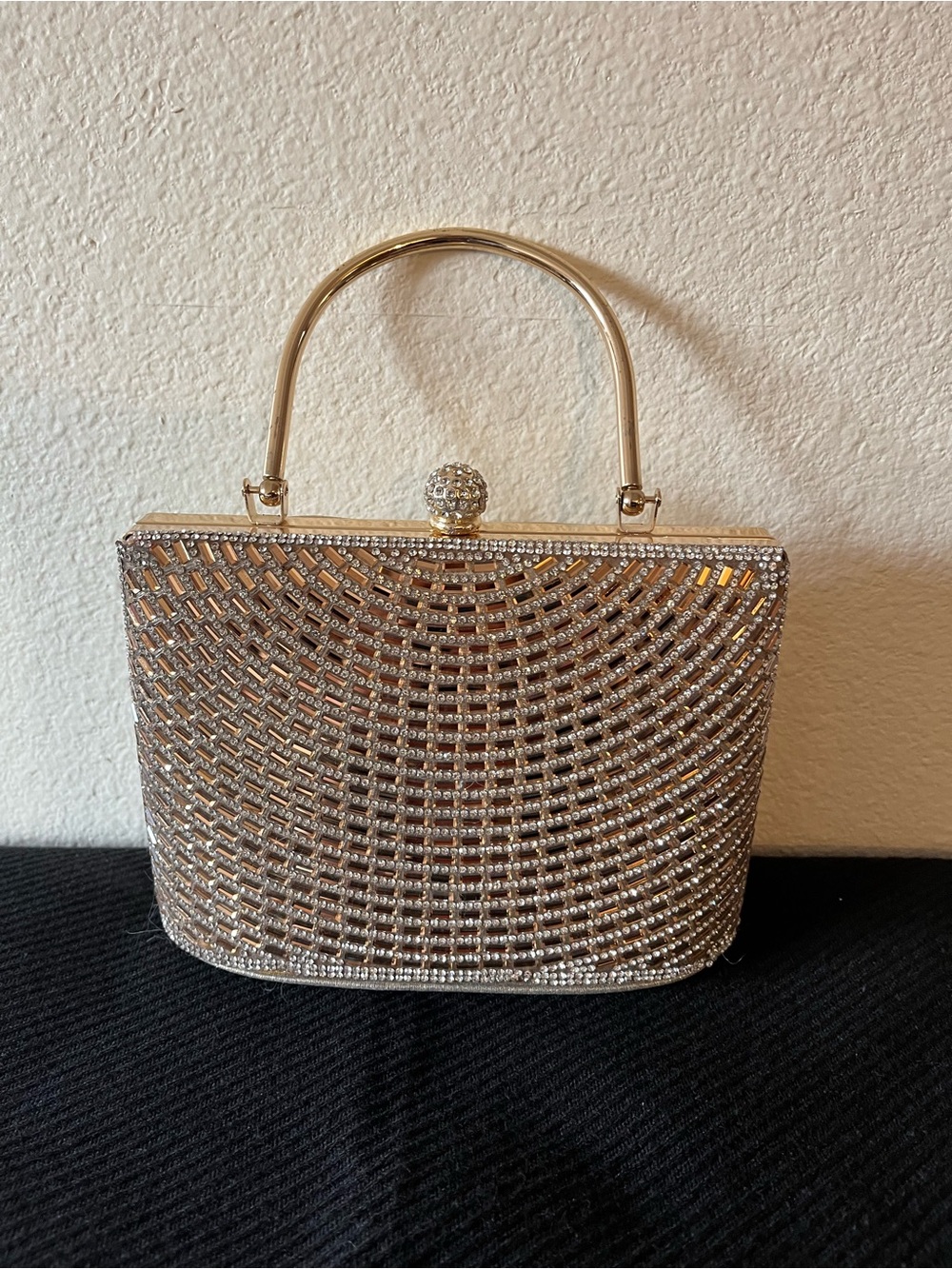 gold-toned metal and rhinestone evening clutch